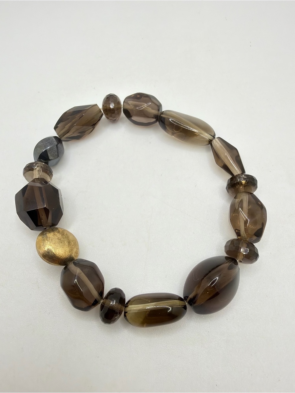 7.5" faceted, polished smokey quartz, w/ hematite and gold accent bracelet!
